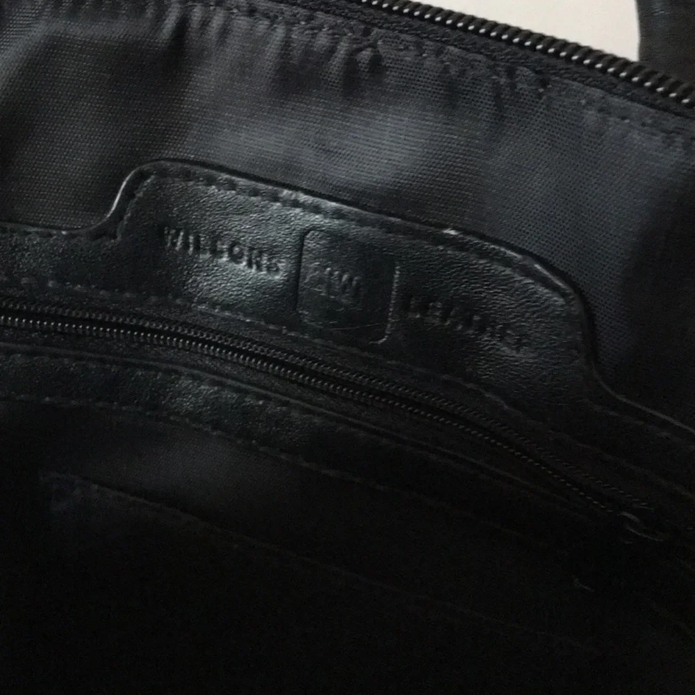 New Wilsons Leather black backpack